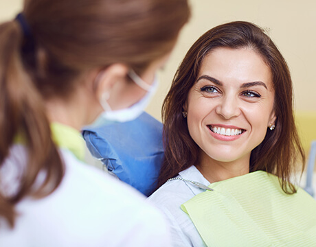 Woman speaking to Guardian dentist